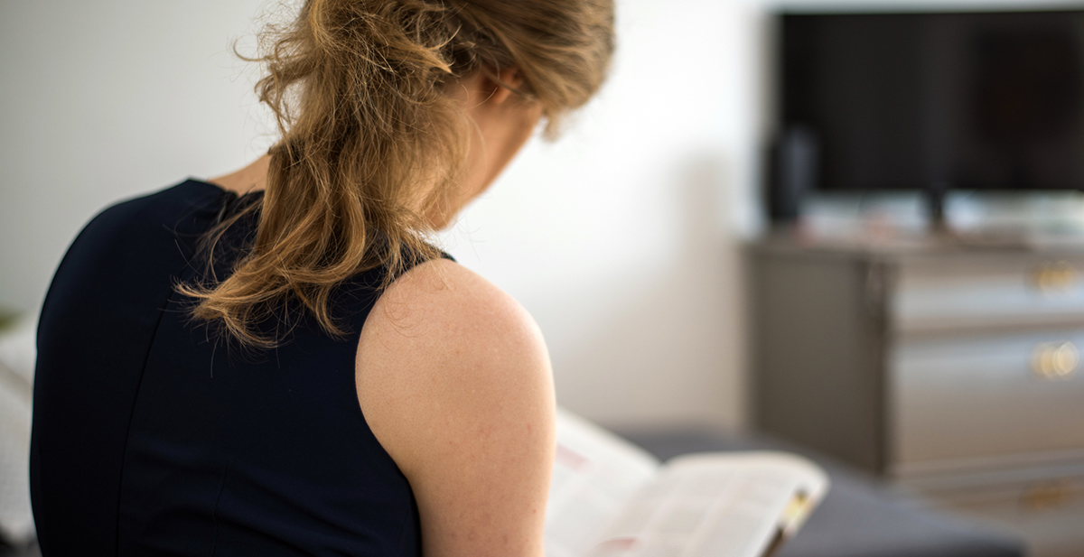 woman reading book