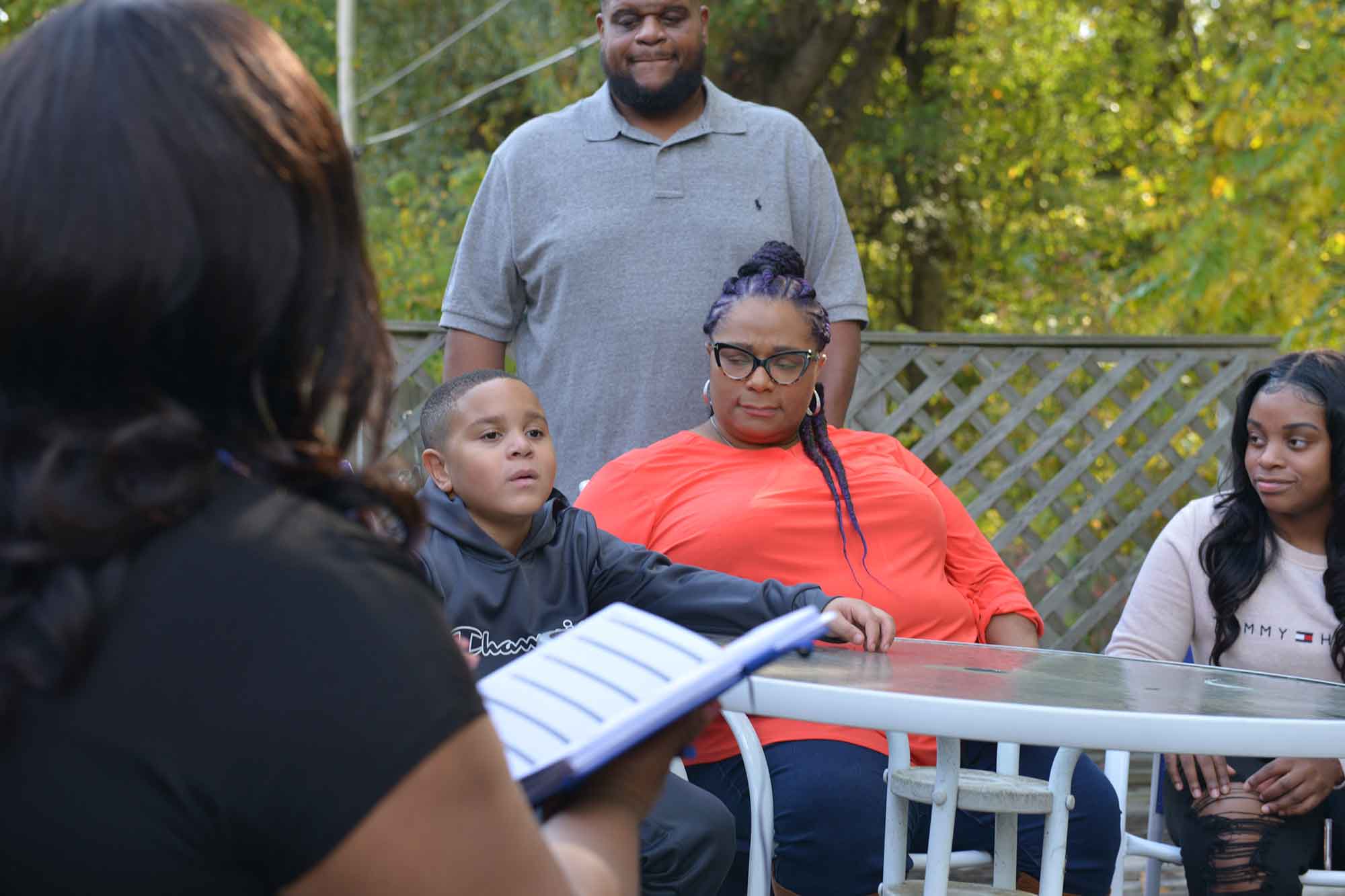 Lance and his family with Youth Villages Specialist