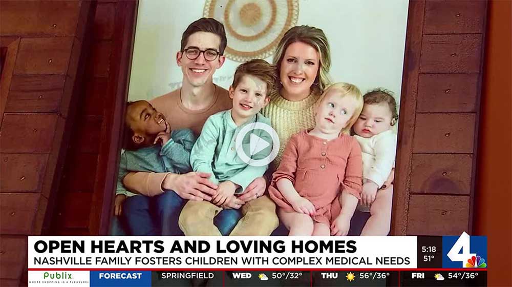 Caleb and Ruchhala Bone, foster parents, pose with their kids