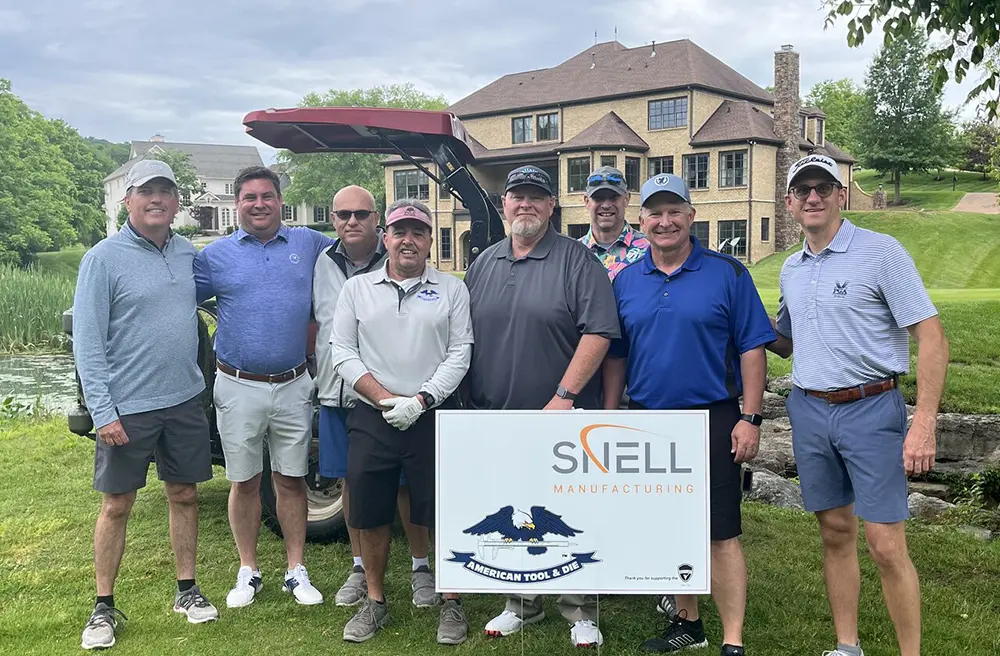 Snell golf group at golf event supporting LifeSet