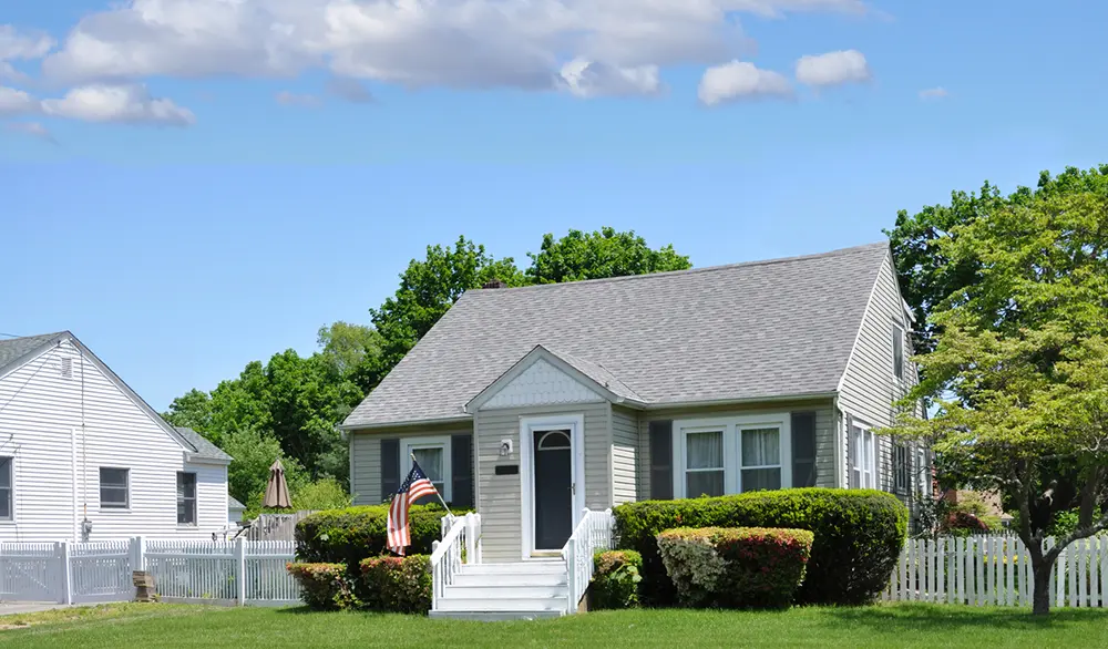 photo of the front yard and home on a sunny day