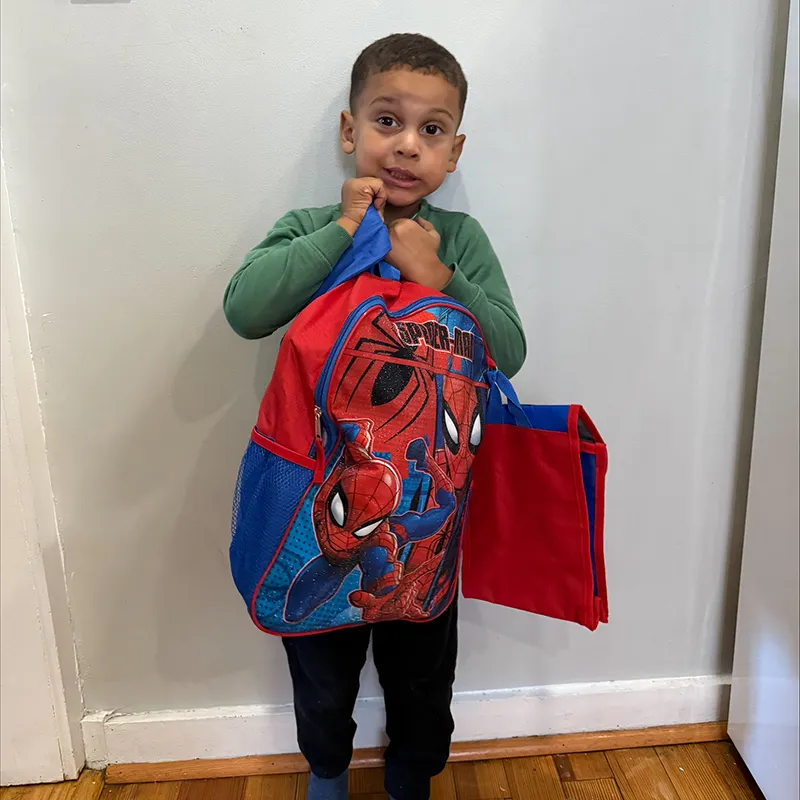 Miguel with a backpack from Backpack Heroes